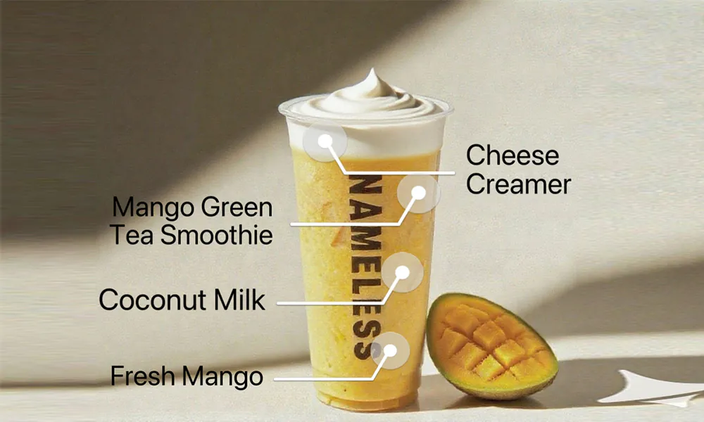 Nameless-Tea&Coffee-Coffee-Shop-Heavy-Mango-Slush-w-Cheese-Creama-Sacramento Mango green tea slush with cheese creamer, coconut milk and fresh mango at Nameless Tea&Coffee, a Coffee Shop in Sacramento